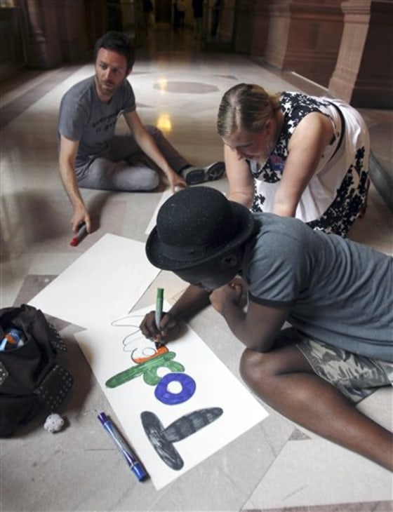 Supporters of gay marriage make signs that read "today" in a hallway at the Capitol in Albany, N.Y., on Wednesday.